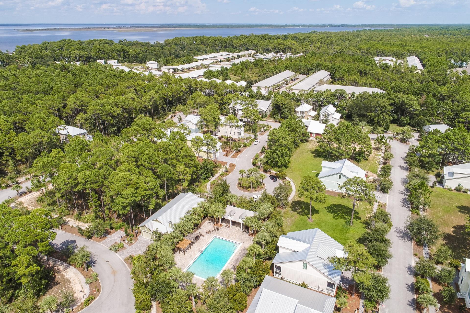 143 Marlberry Santa Rosa Beach Santa Rosa Beach, FL 32459 - Photo 53 of 53 a view of a lake with a building in the background