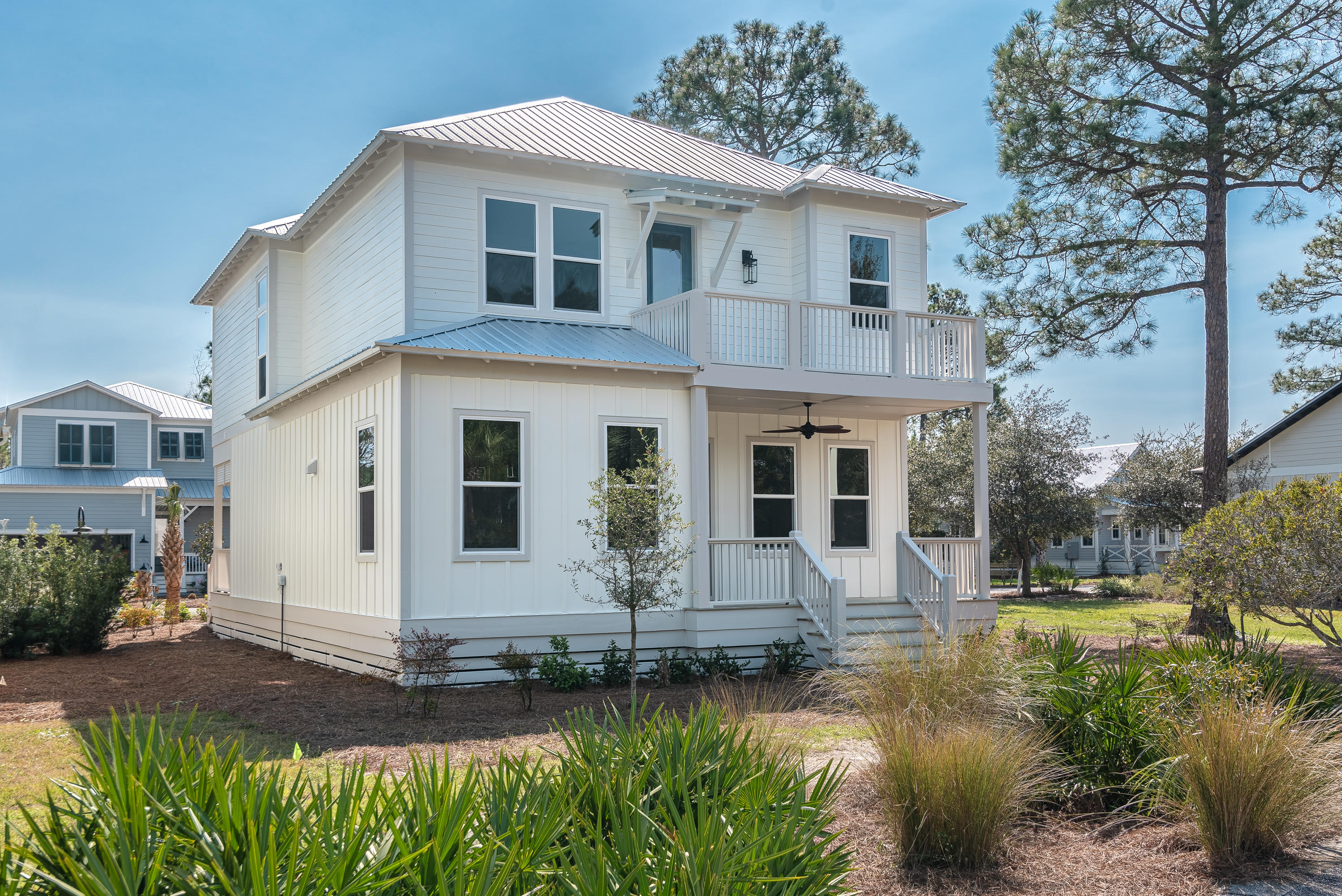 143 Marlberry Santa Rosa Beach Santa Rosa Beach, FL 32459 - Photo 7 of 53 a front view of a house with garden