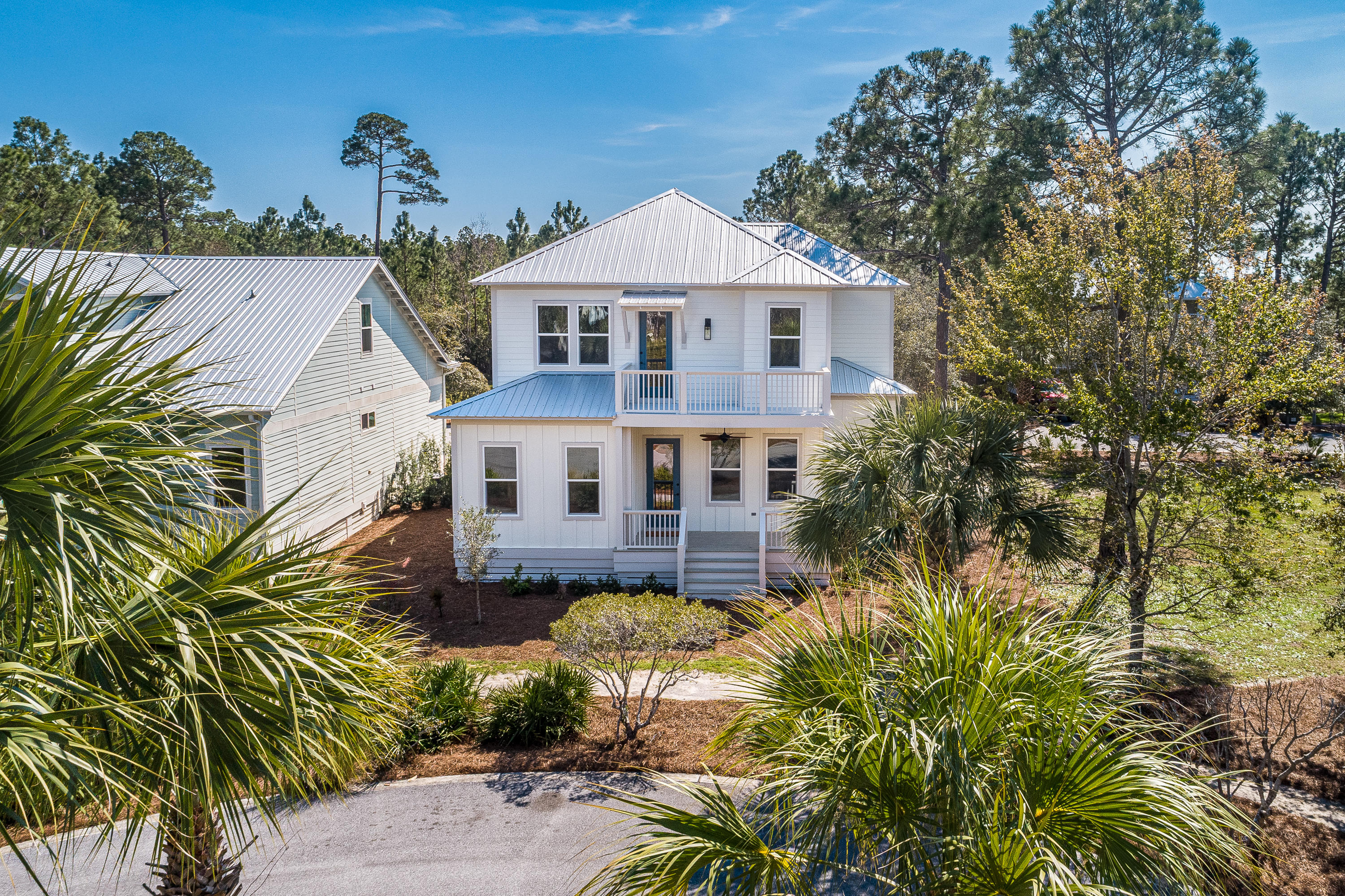 143 Marlberry Santa Rosa Beach Santa Rosa Beach, FL 32459 - Photo 8 of 53 a front view of a house with a yard