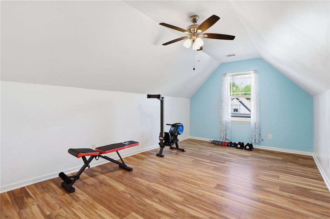 347 Riverdale Road Simpsonville, SC 29680 - Photo 19 of 30 Bright and airy bonus room with wood flooring, an ideal flex space.