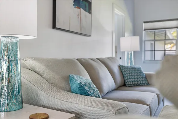 a living room with furniture and a couch