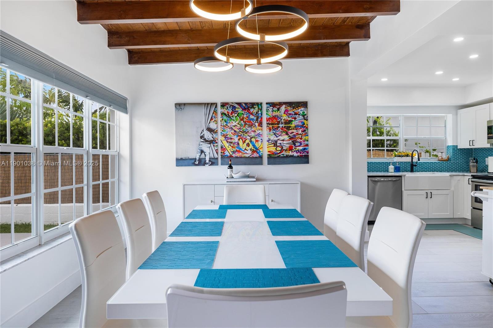 8926 Abbott Avenue Surfside, FL 33154 - Photo 3 of 30 a room with furniture and a rug