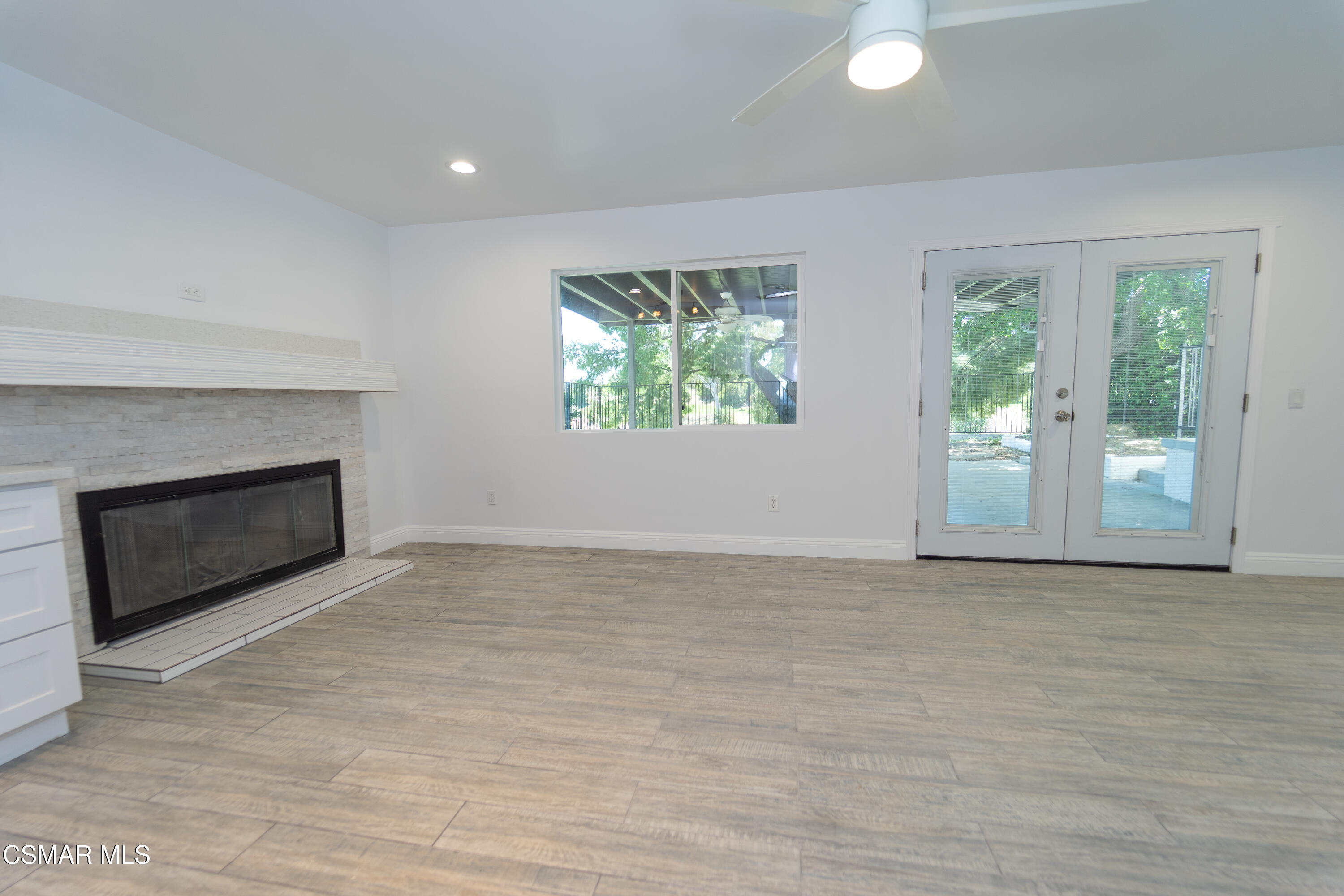 11723 Porter Valley Drive Porter Ranch, CA 91326 - Photo 20 of 64 an empty room with windows