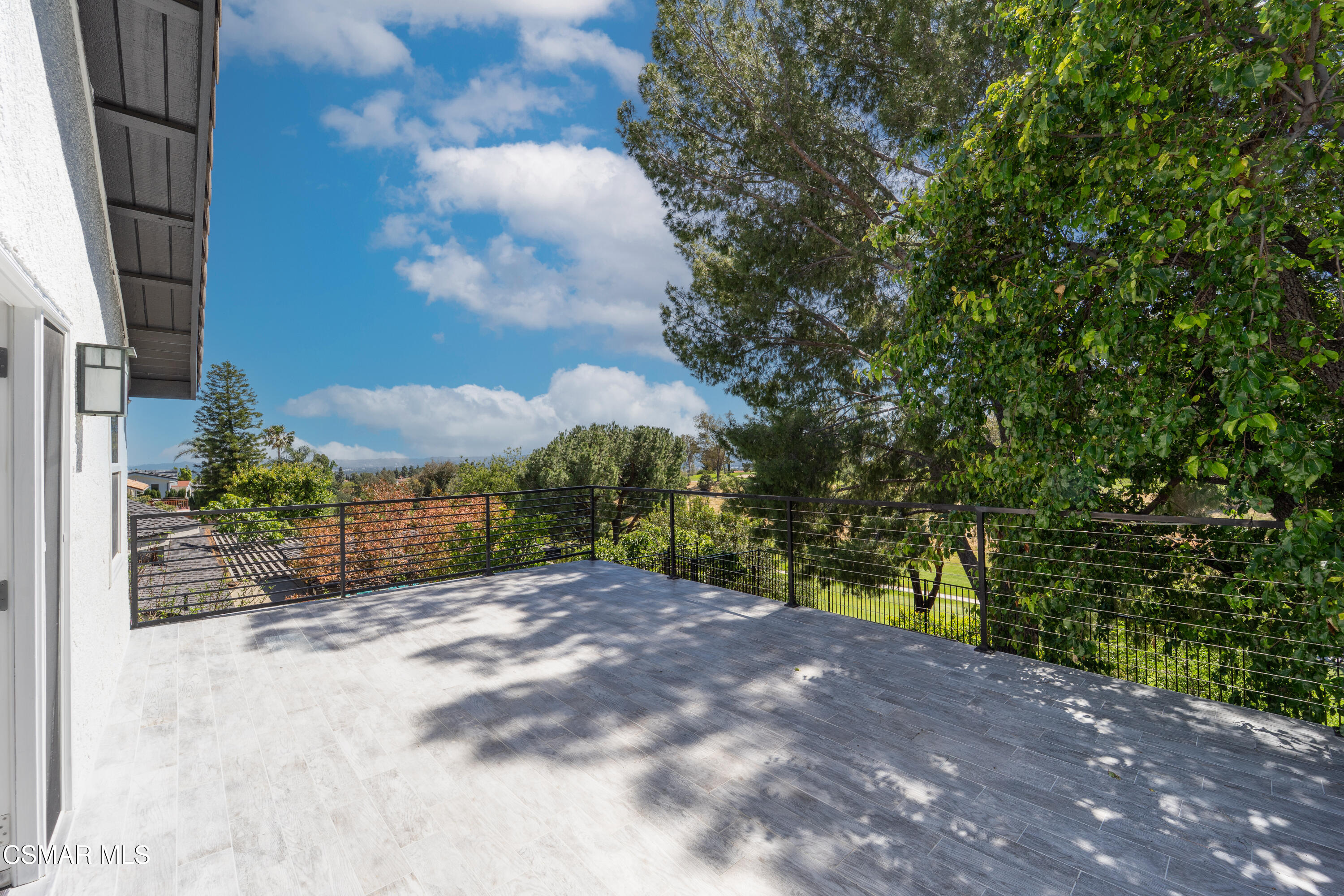 11723 Porter Valley Drive Porter Ranch, CA 91326 - Photo 30 of 64 a view of a yard with an tree
