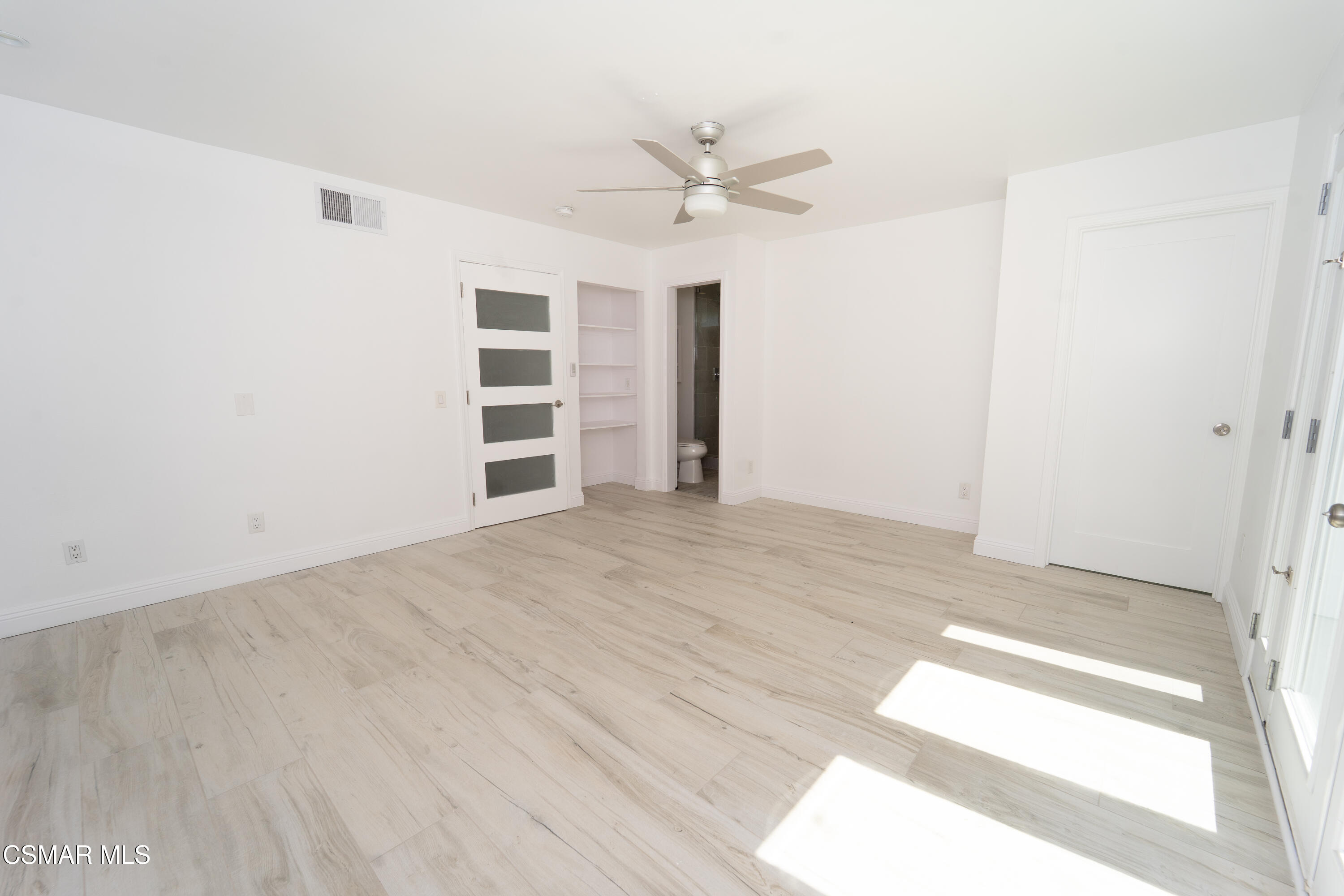 11723 Porter Valley Drive Porter Ranch, CA 91326 - Photo 32 of 64 a view of an empty room with a window