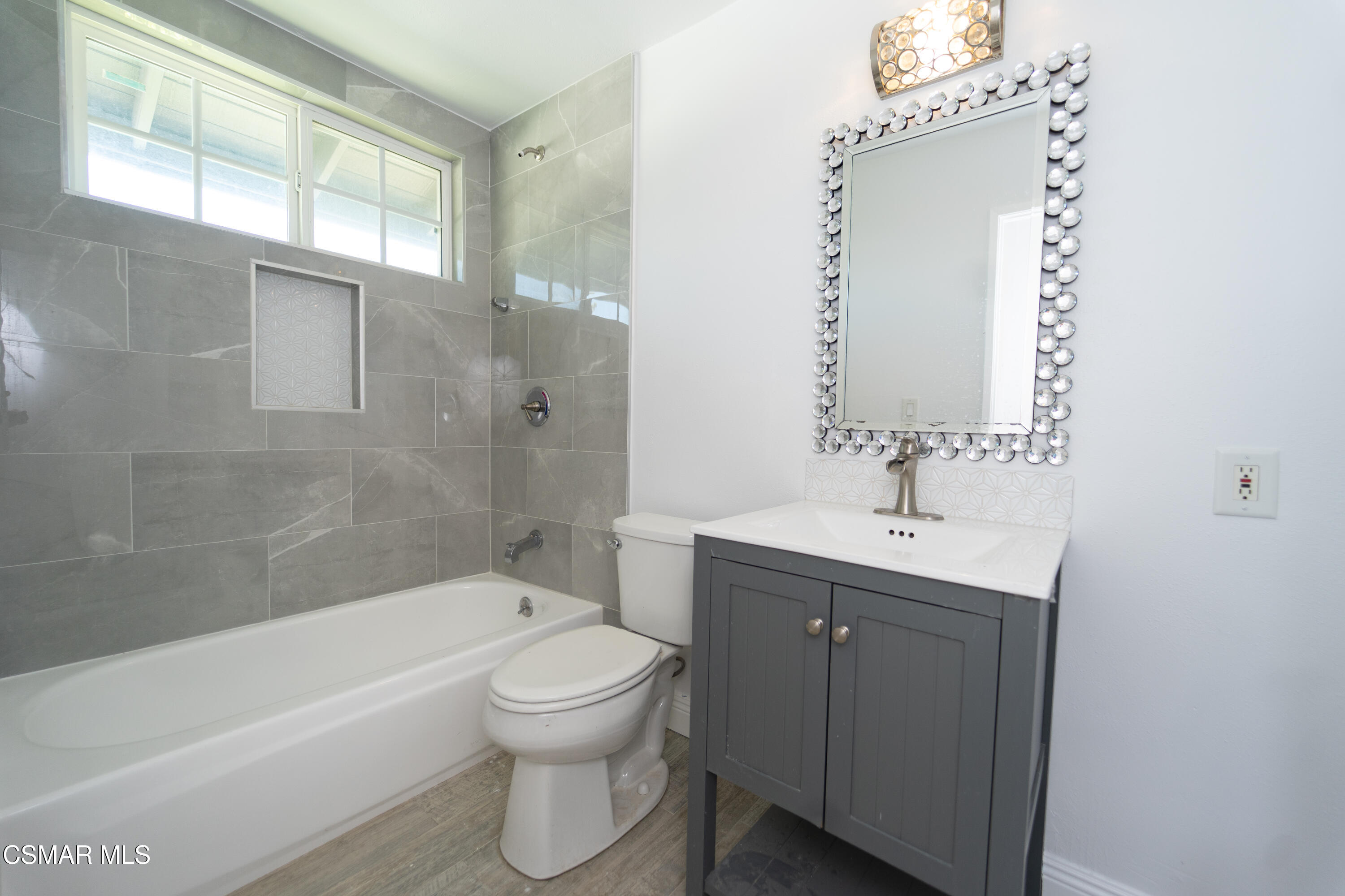 11723 Porter Valley Drive Porter Ranch, CA 91326 - Photo 39 of 64 a bathroom with a sink toilet and shower