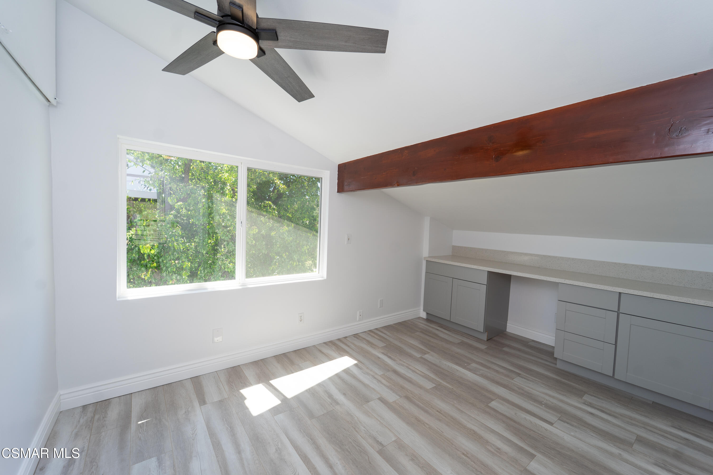 11723 Porter Valley Drive Porter Ranch, CA 91326 - Photo 42 of 64 a view of empty room with wooden floor and fan