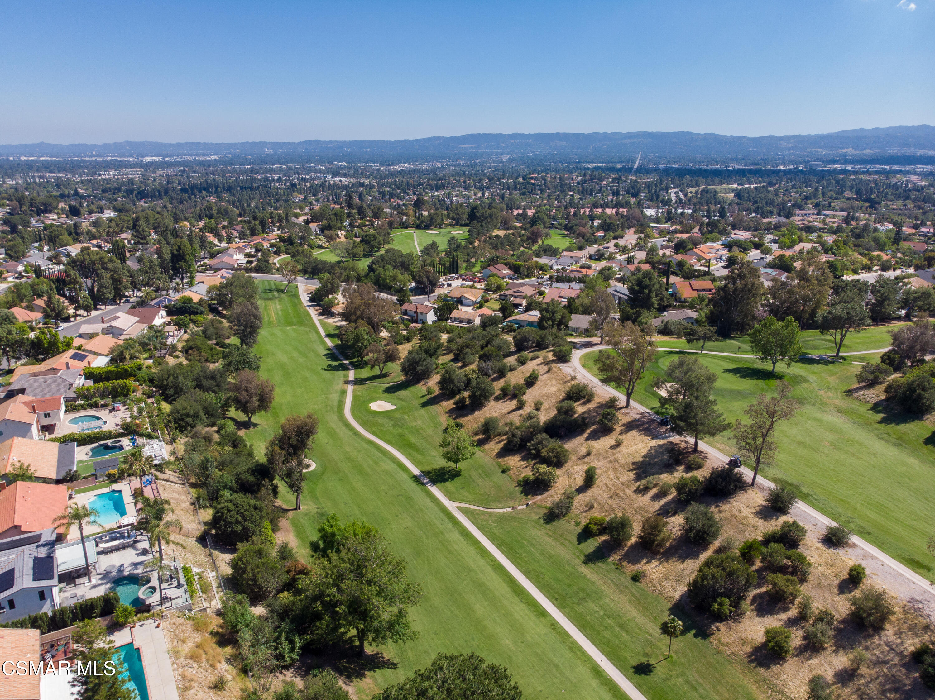 11723 Porter Valley Drive Porter Ranch, CA 91326 - Photo 52 of 64 an aerial view of residential houses with outdoor space and trees