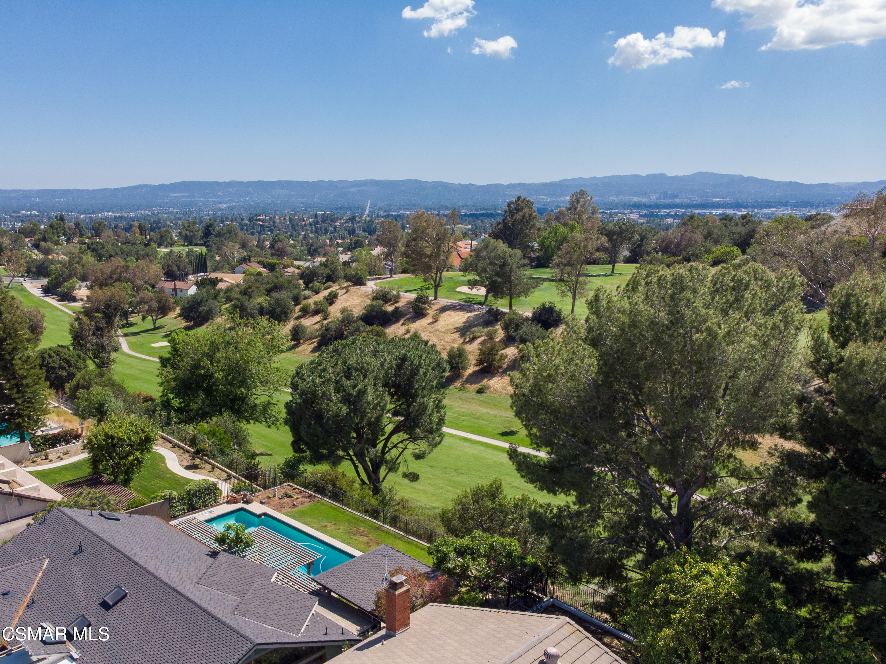 11723 Porter Valley Drive Porter Ranch, CA 91326 - Photo 62 of 64 an aerial view of a city with lots of residential buildings