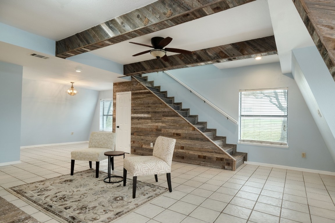 20500 Keilman Lane Pflugerville, TX 78660 - Photo 12 of 36 Stairway up to private office space with 1/2 bath under stairs