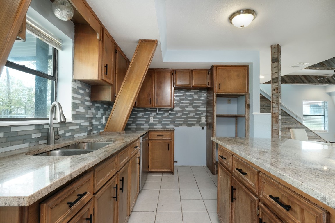 20500 Keilman Lane Pflugerville, TX 78660 - Photo 14 of 36 View from Kitchen to stairs behind main reception area
