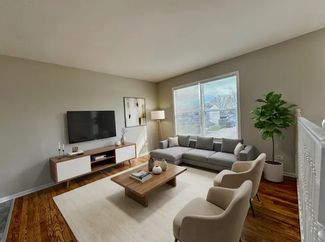 a view of hallway with wooden floor