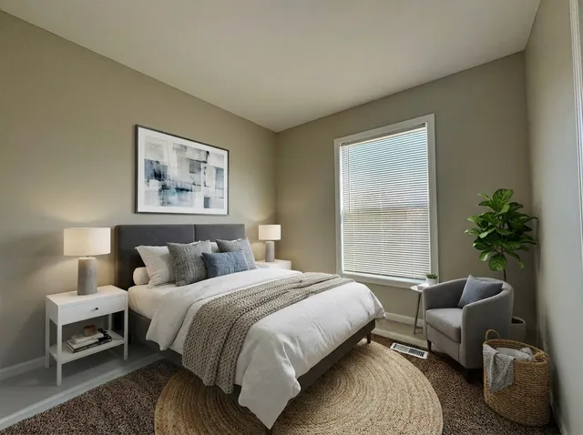 a large kitchen with stainless steel appliances granite countertop a refrigerator and a stove top oven