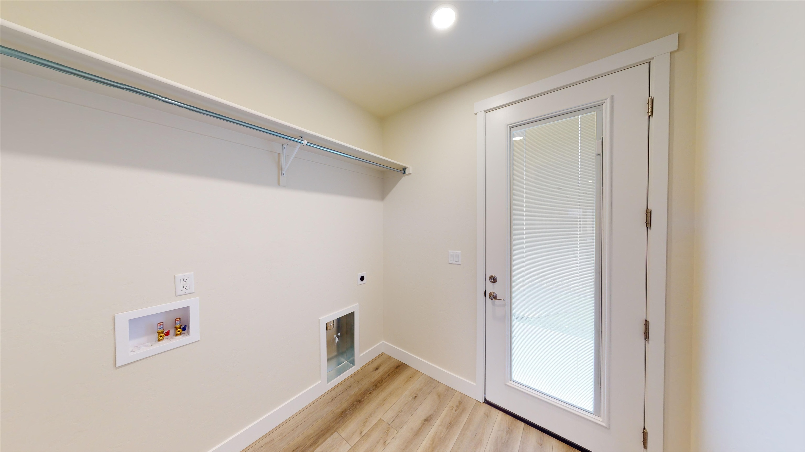 1747 Iron Drive Fruita, CO 81521 - Photo 19 of 30 a view of a hallway with wooden floor