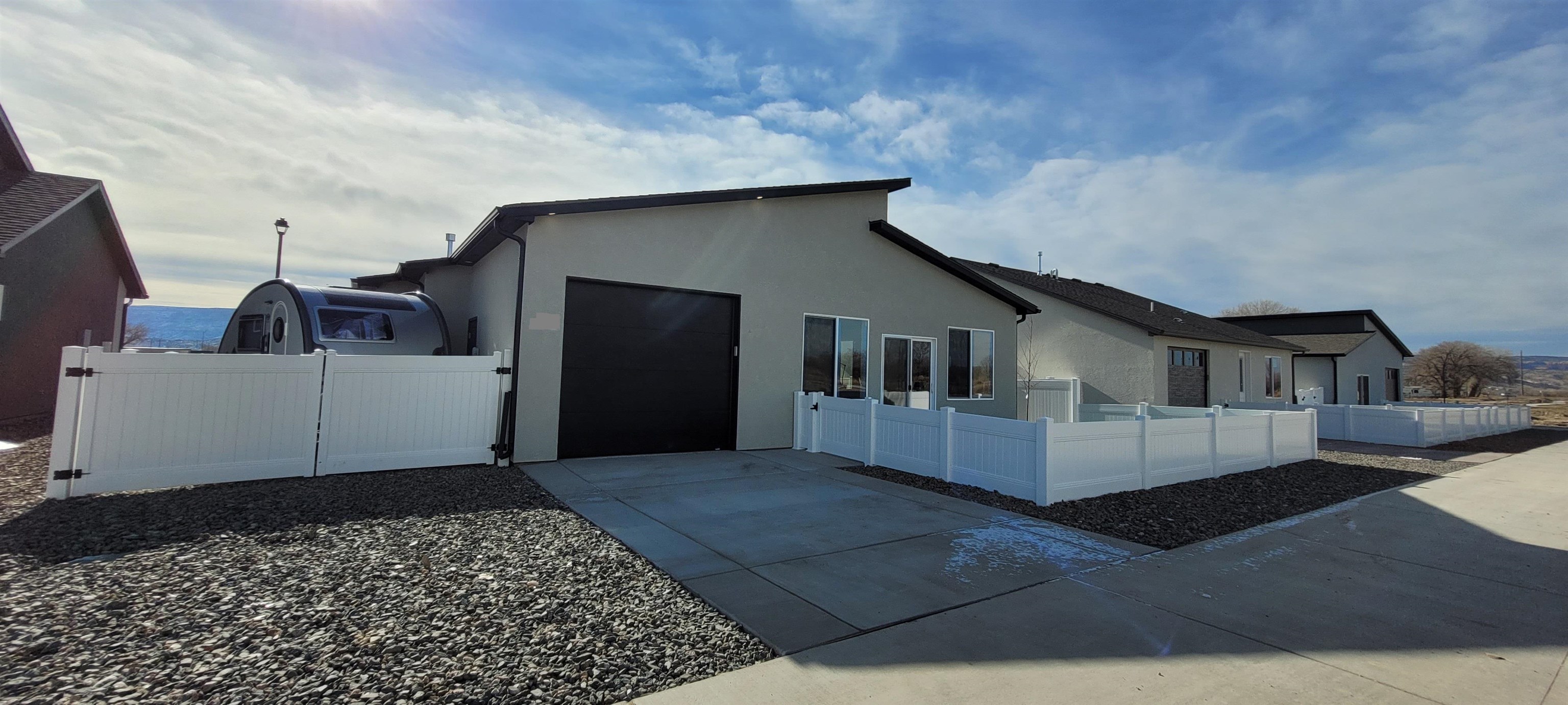 1747 Iron Drive Fruita, CO 81521 - Photo 23 of 30 a view of a house with a yard