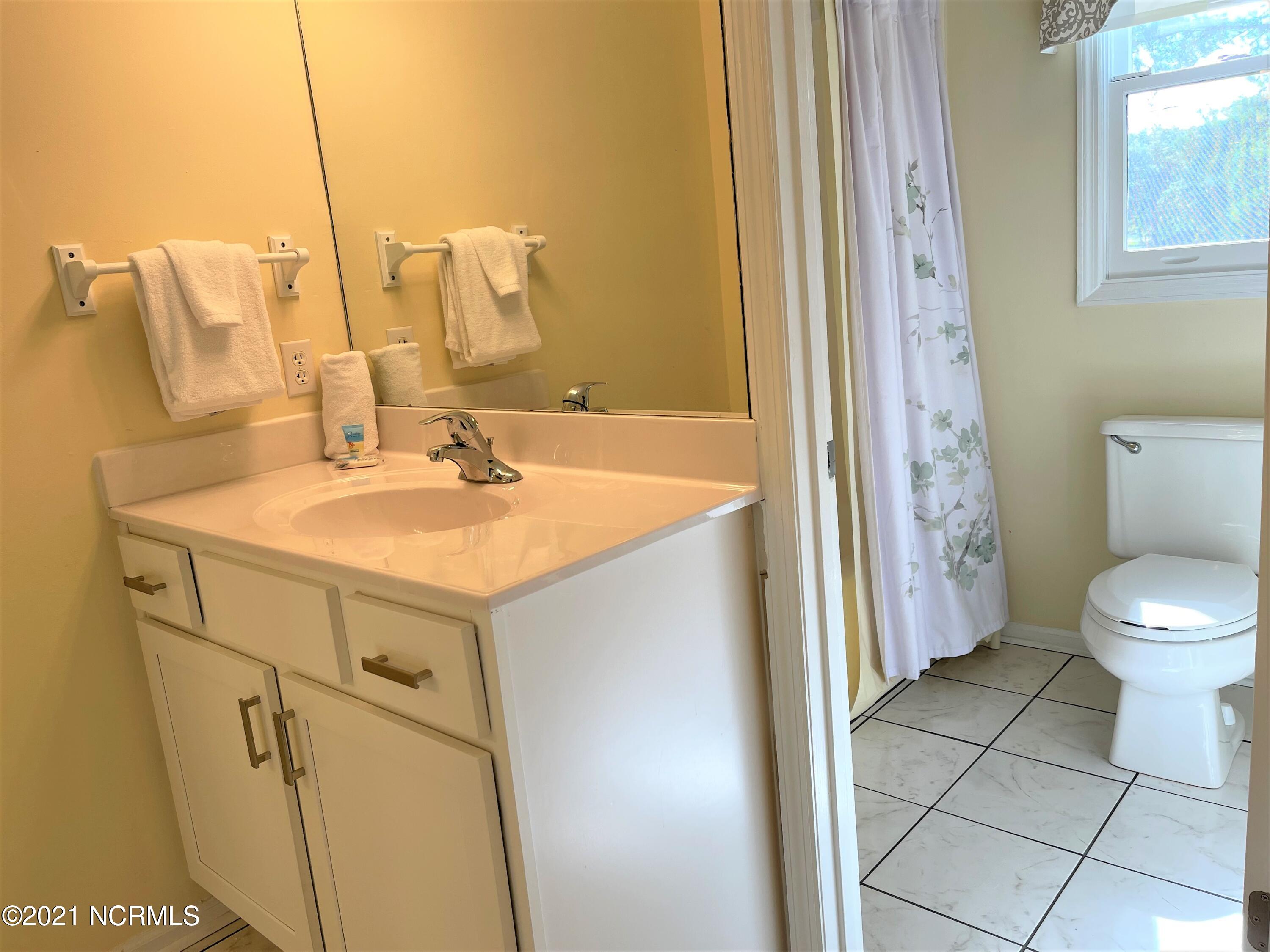 242 Clubhouse Road, Unit A Sunset Beach, NC 28468 - Photo 8 of 31 Mini Suite Bath