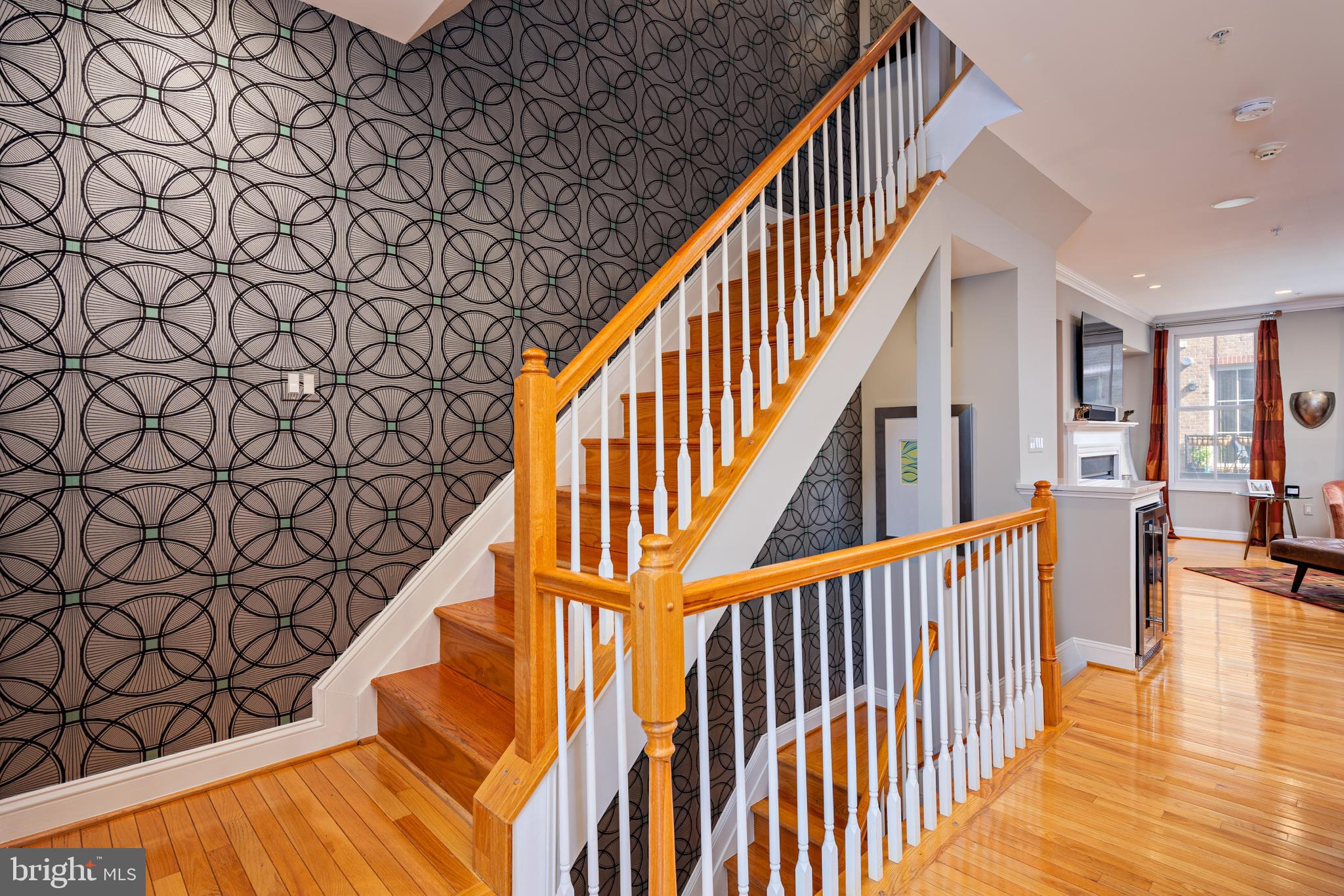 2317 Boston Street, Unit 3 Baltimore, MD 21224 - Photo 20 of 51 a view of entryway with wooden floor and stairs