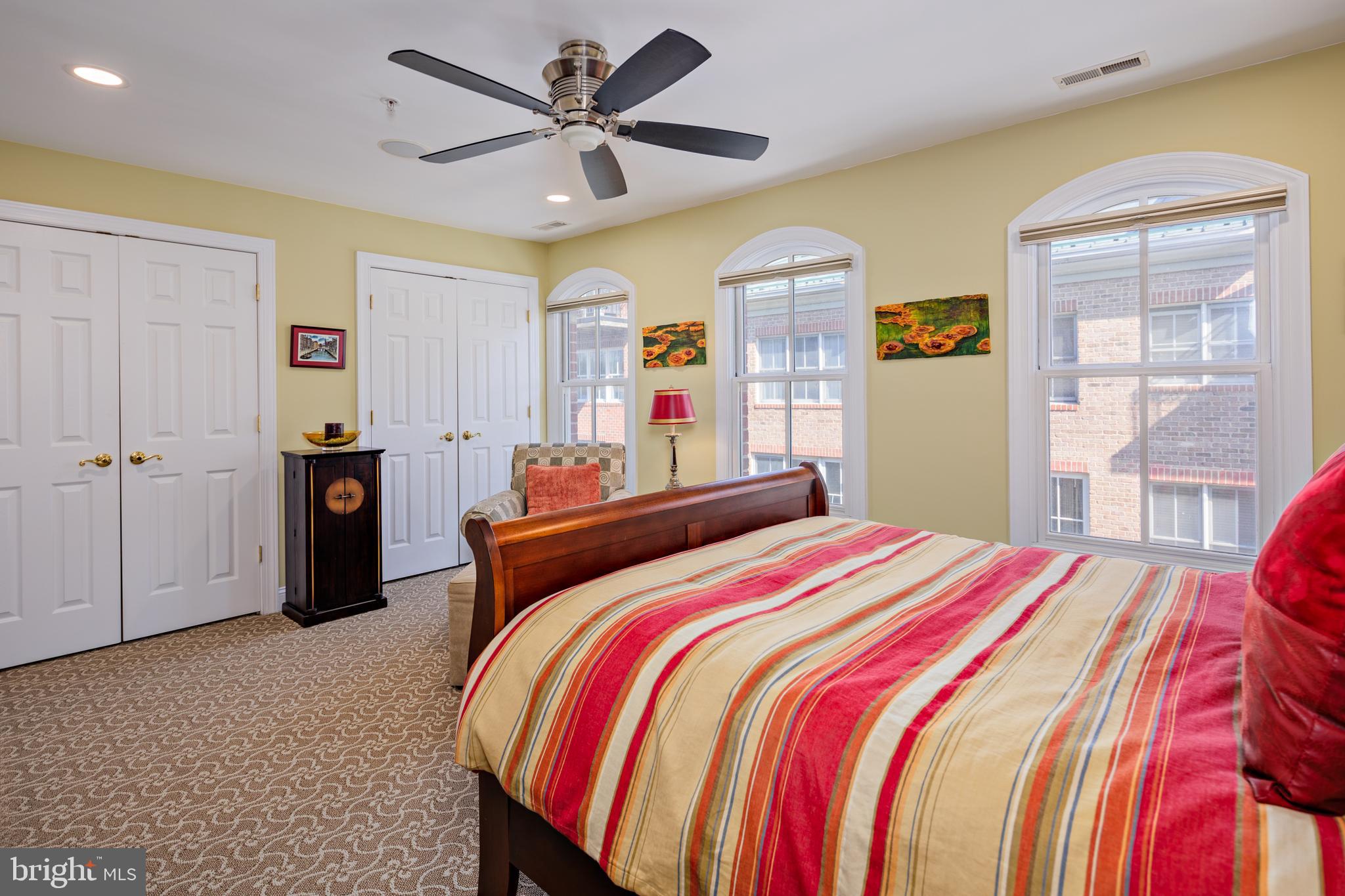 2317 Boston Street, Unit 3 Baltimore, MD 21224 - Photo 25 of 51 a bedroom with a bed and dresser