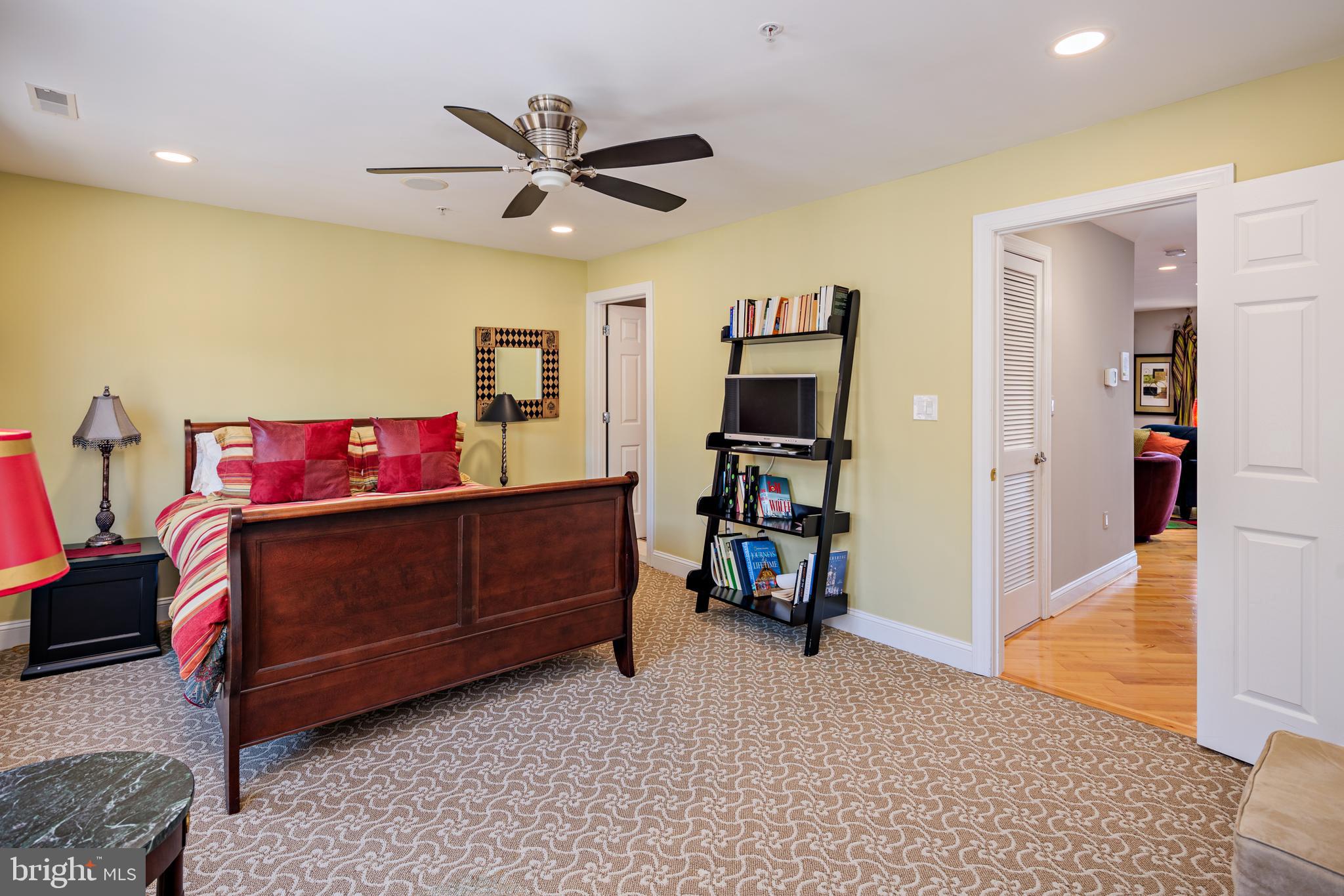 2317 Boston Street, Unit 3 Baltimore, MD 21224 - Photo 26 of 51 a bedroom with a bed and furniture