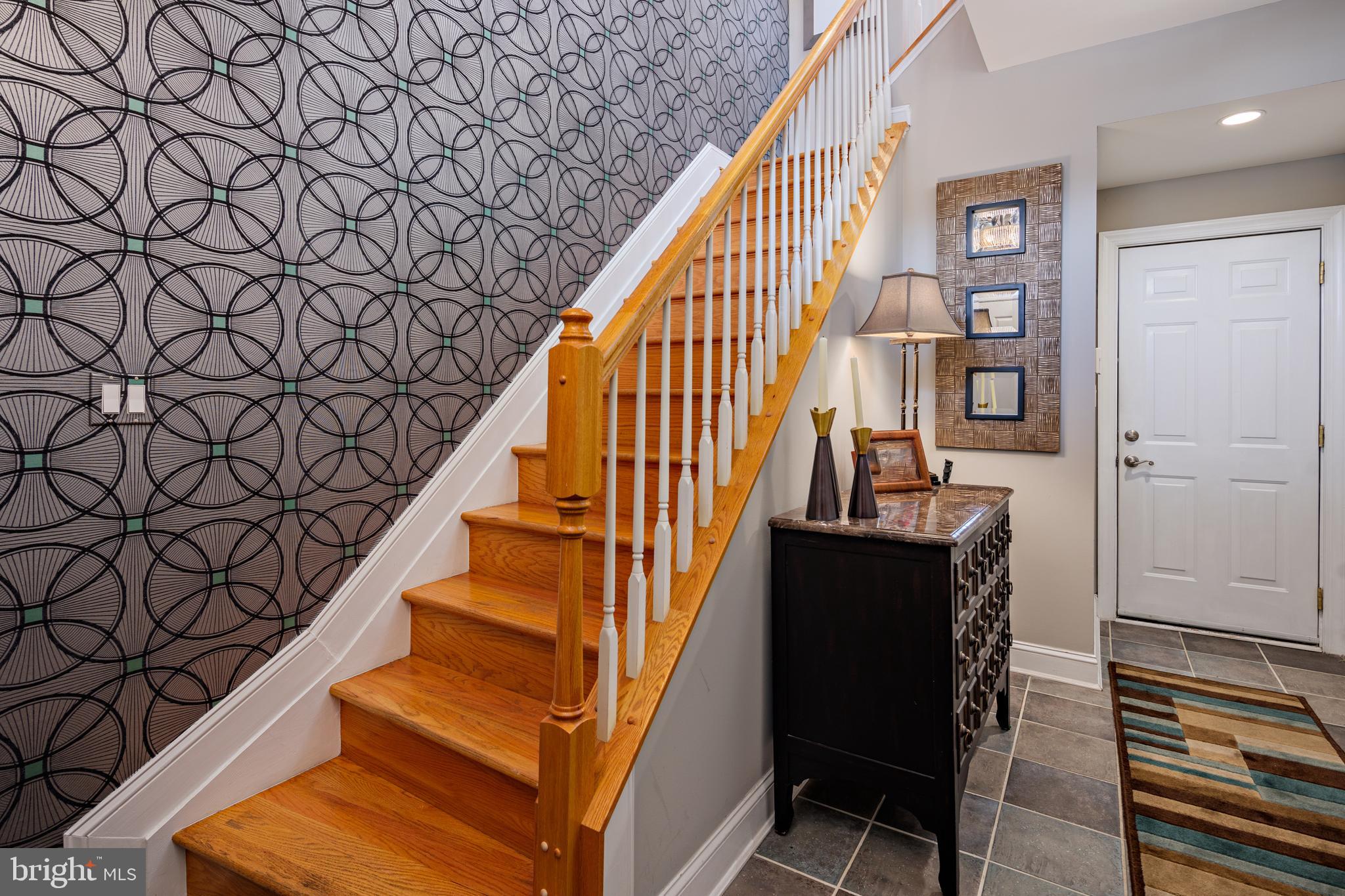 2317 Boston Street, Unit 3 Baltimore, MD 21224 - Photo 45 of 51 a view of entryway with wooden floor and stairs