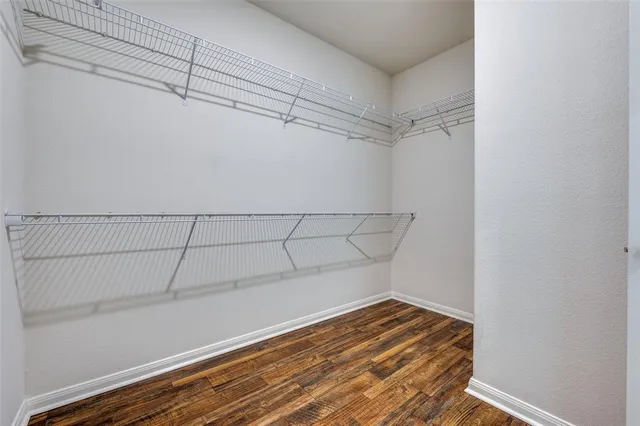 a view of a room with racks on the wall