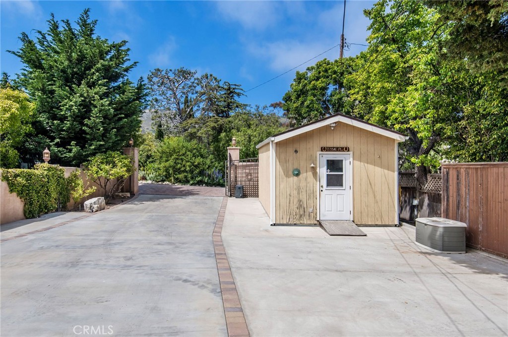 1 Thyme Place Rancho Palos Verdes, CA 90275 - Photo 4 of 35 a view of a house with a yard and garage