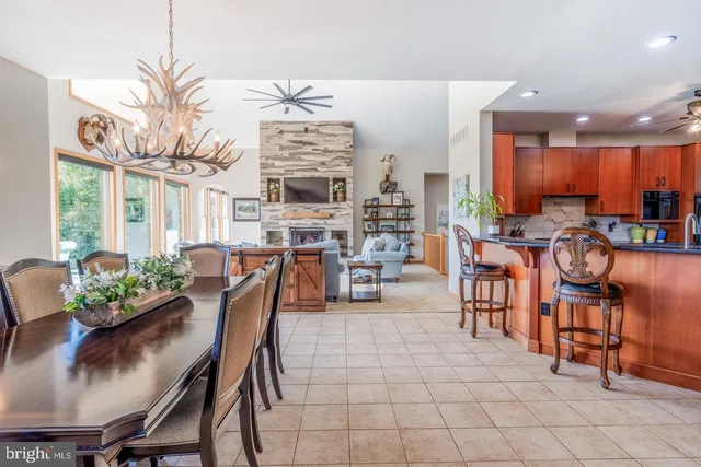 a view of a dining room with furniture window and outside view