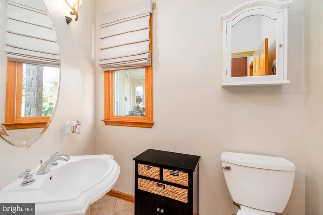 a spacious bedroom with a bed and a table