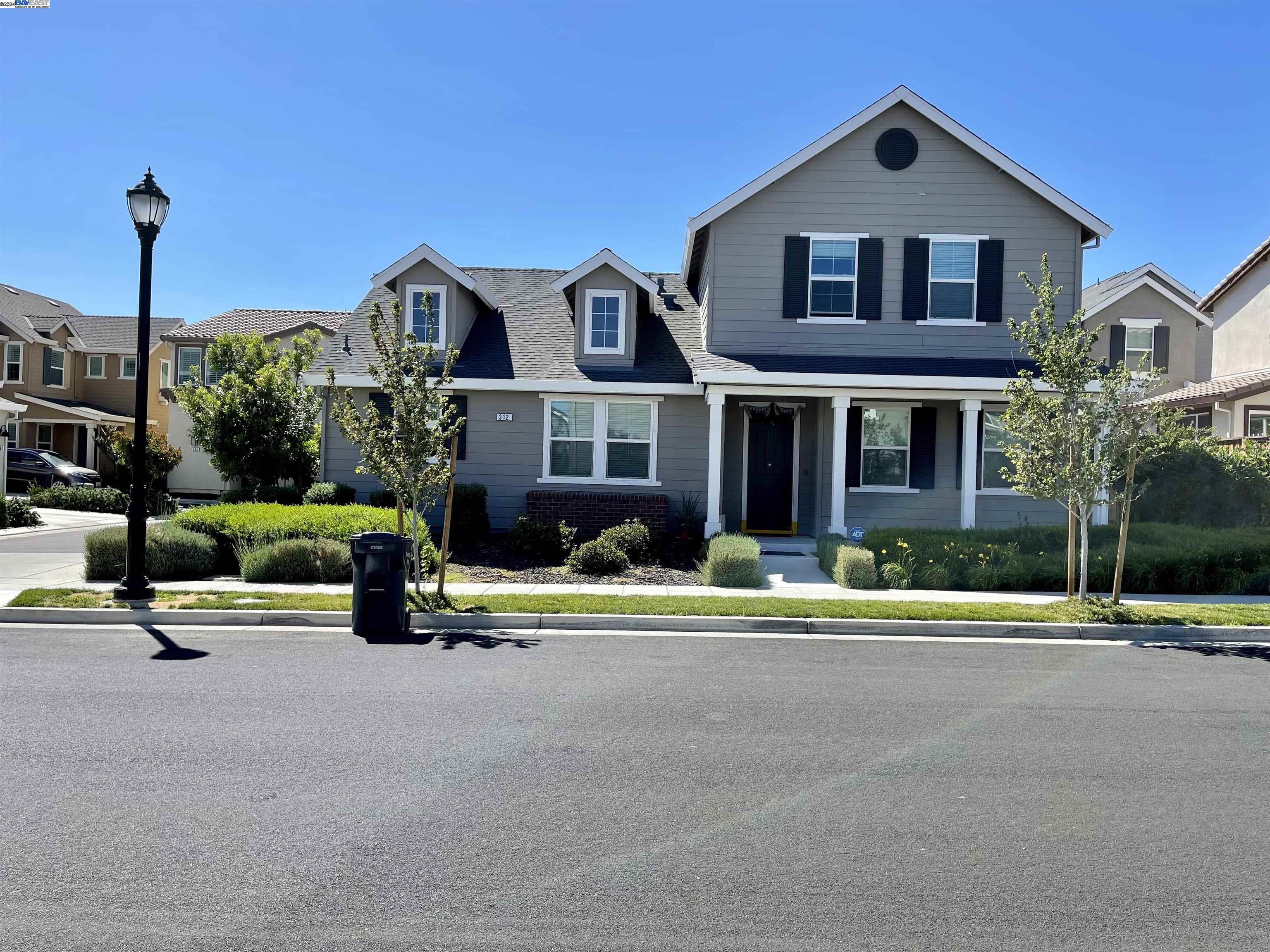 a house view with a garden space