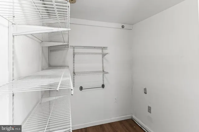 a view of a room with racks on the wall