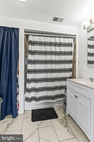 a kitchen with a cabinets and appliances