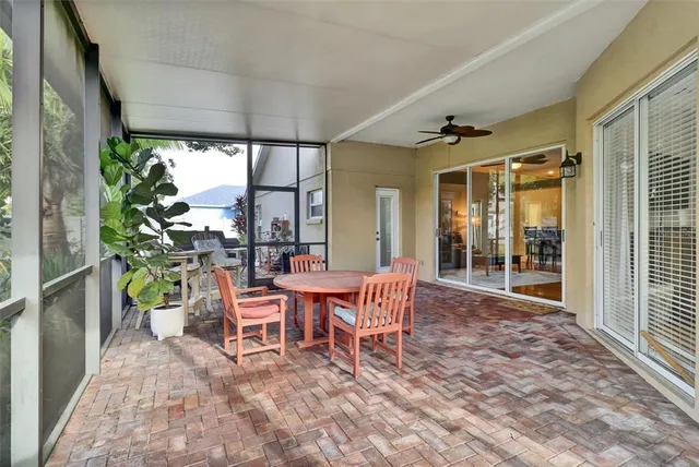 a dining room with a table and chairs