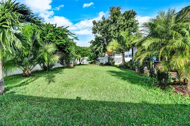 a view of a backyard with a garden
