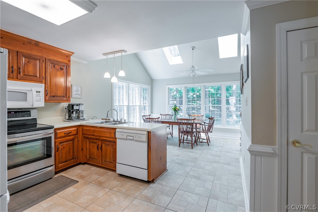 15008 Gates Mill Road Midlothian, VA 23112 - Photo 11 of 37 a large kitchen with kitchen island a sink table and chairs