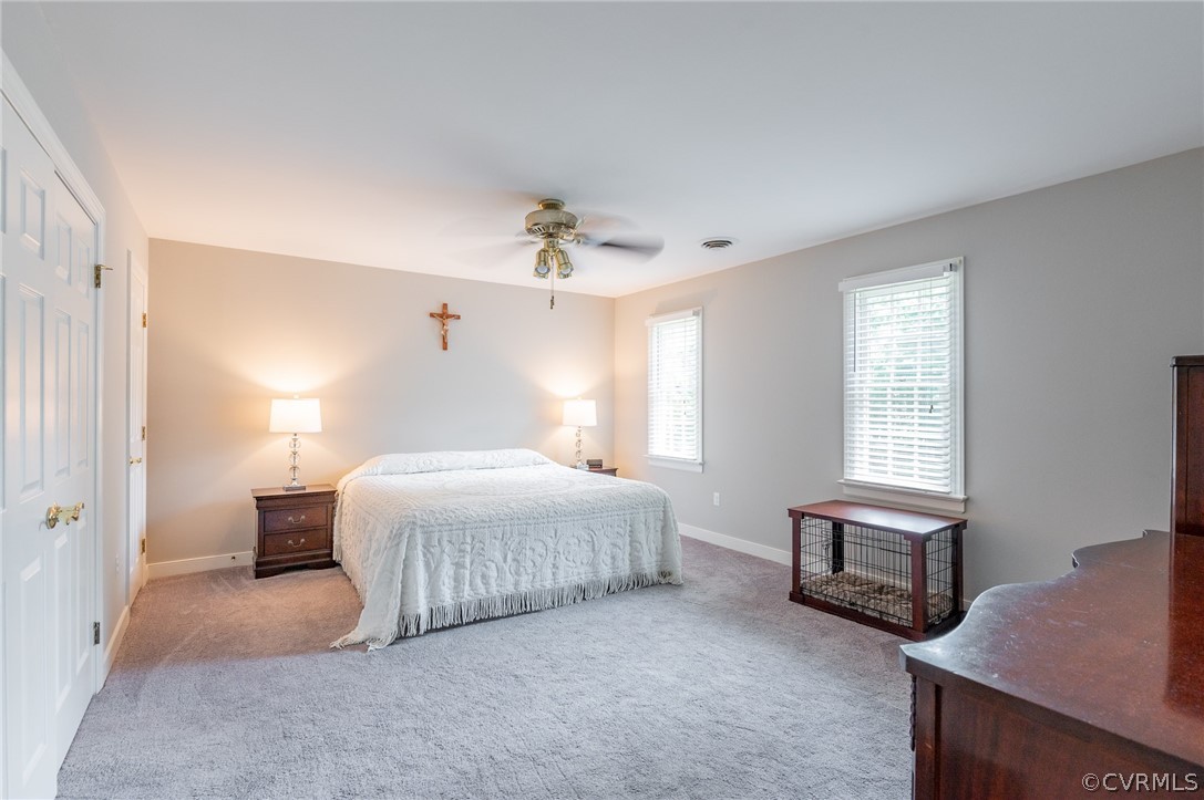 15008 Gates Mill Road Midlothian, VA 23112 - Photo 19 of 37 a bedroom with a bed and a window