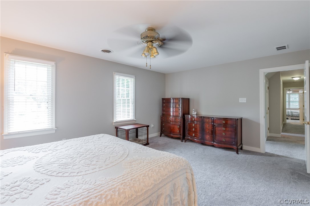 15008 Gates Mill Road Midlothian, VA 23112 - Photo 20 of 37 a bedroom with a bed dresser and a window