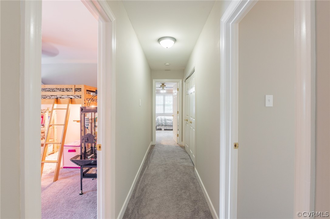 15008 Gates Mill Road Midlothian, VA 23112 - Photo 24 of 37 a view of a hallway with wooden floor and closet