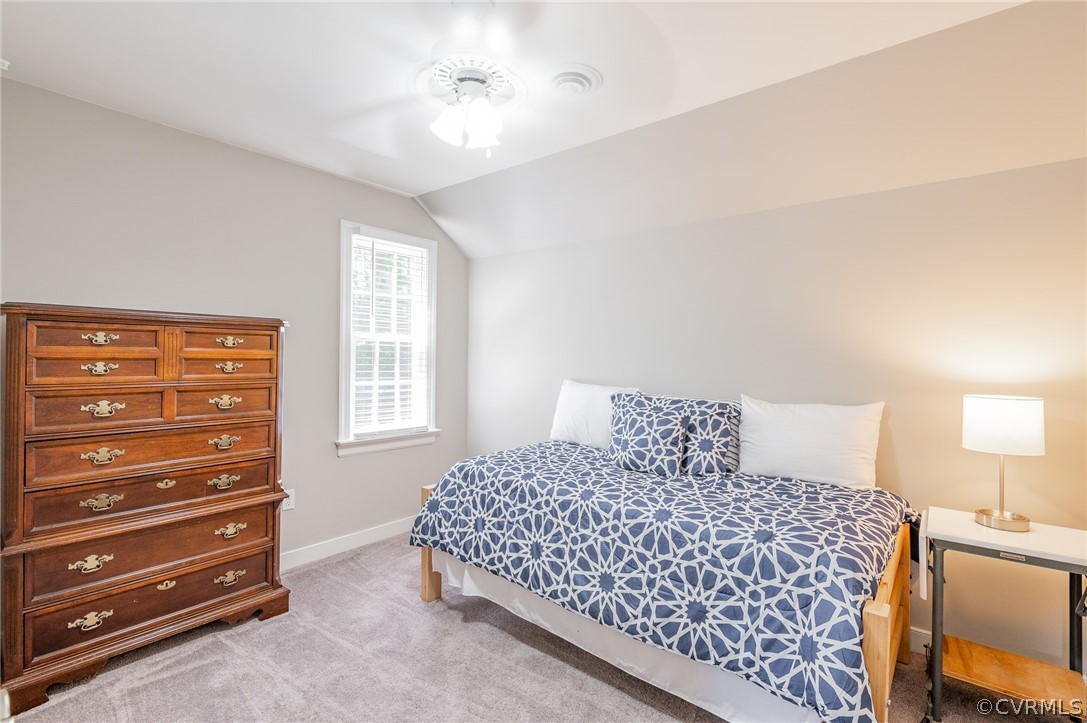 15008 Gates Mill Road Midlothian, VA 23112 - Photo 25 of 37 a bedroom with a bed and a night stand
