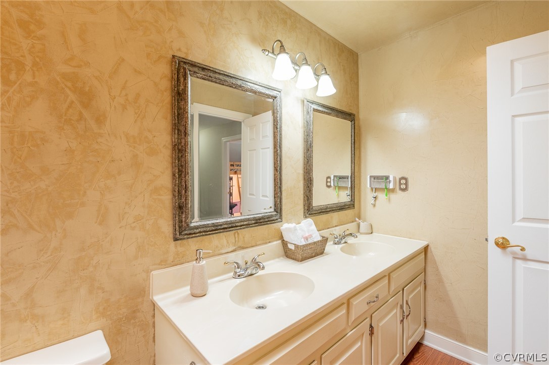 15008 Gates Mill Road Midlothian, VA 23112 - Photo 29 of 37 a bathroom with a sink vanity and a mirror