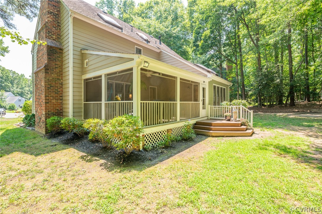 15008 Gates Mill Road Midlothian, VA 23112 - Photo 33 of 37 a view of a house with backyard and sitting area