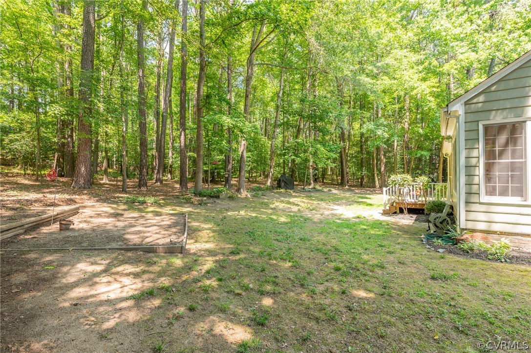 15008 Gates Mill Road Midlothian, VA 23112 - Photo 37 of 37 a view of outdoor space with deck and trees
