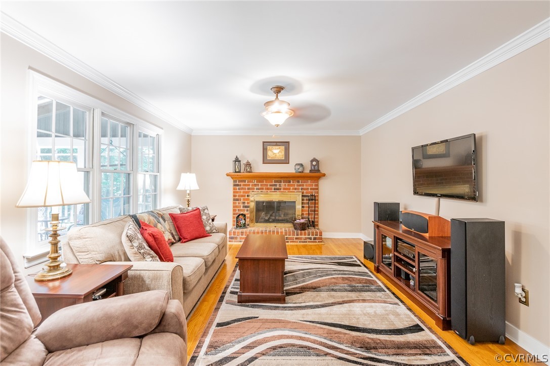 15008 Gates Mill Road Midlothian, VA 23112 - Photo 10 of 37 a living room with furniture and a flat screen tv