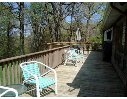 640 Deerfield Road Washington, PA 15301 - Photo 16 of 18 Patio/Deck. The rear deck offers privacy and a natural wooded panorama abundant with wildlife.