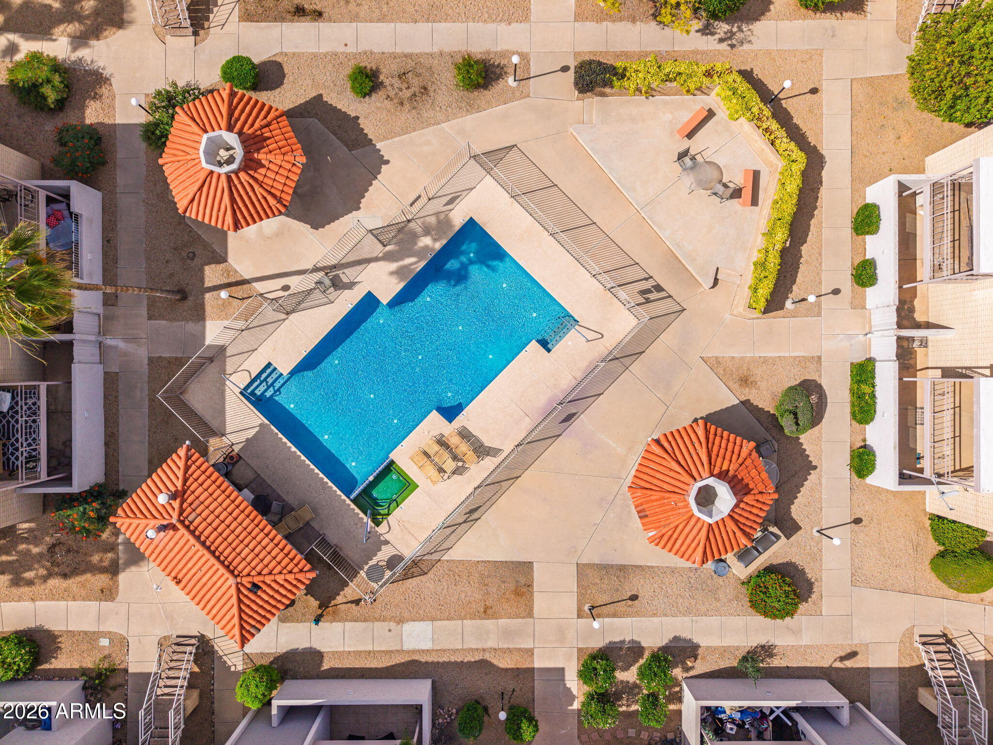 16635 North Cave Creek Road, Unit 215 Phoenix, AZ 85032 - Photo 24 of 27 an aerial view of a house with a swimming pool