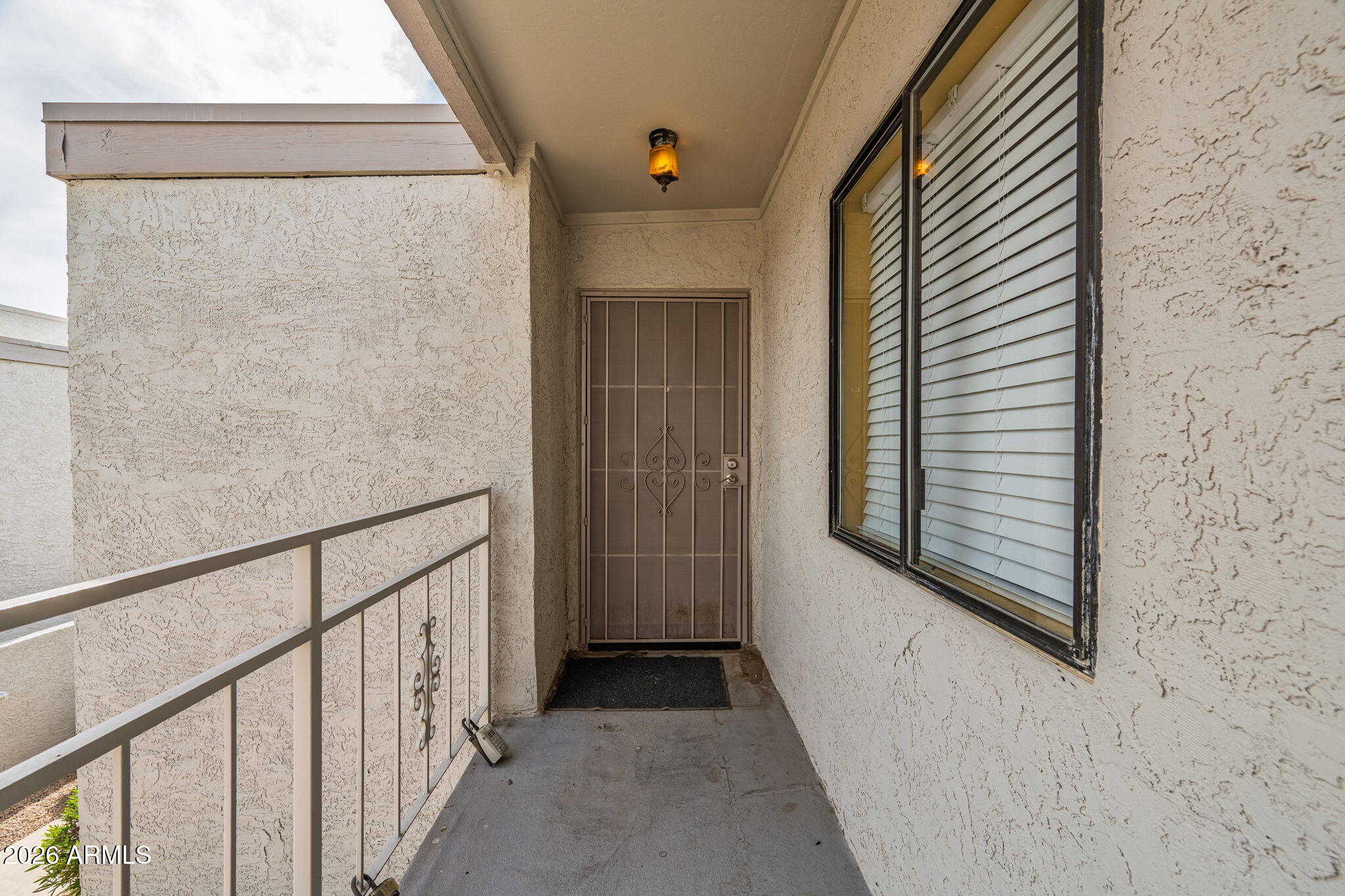 16635 North Cave Creek Road, Unit 215 Phoenix, AZ 85032 - Photo 2 of 27 a view of a balcony