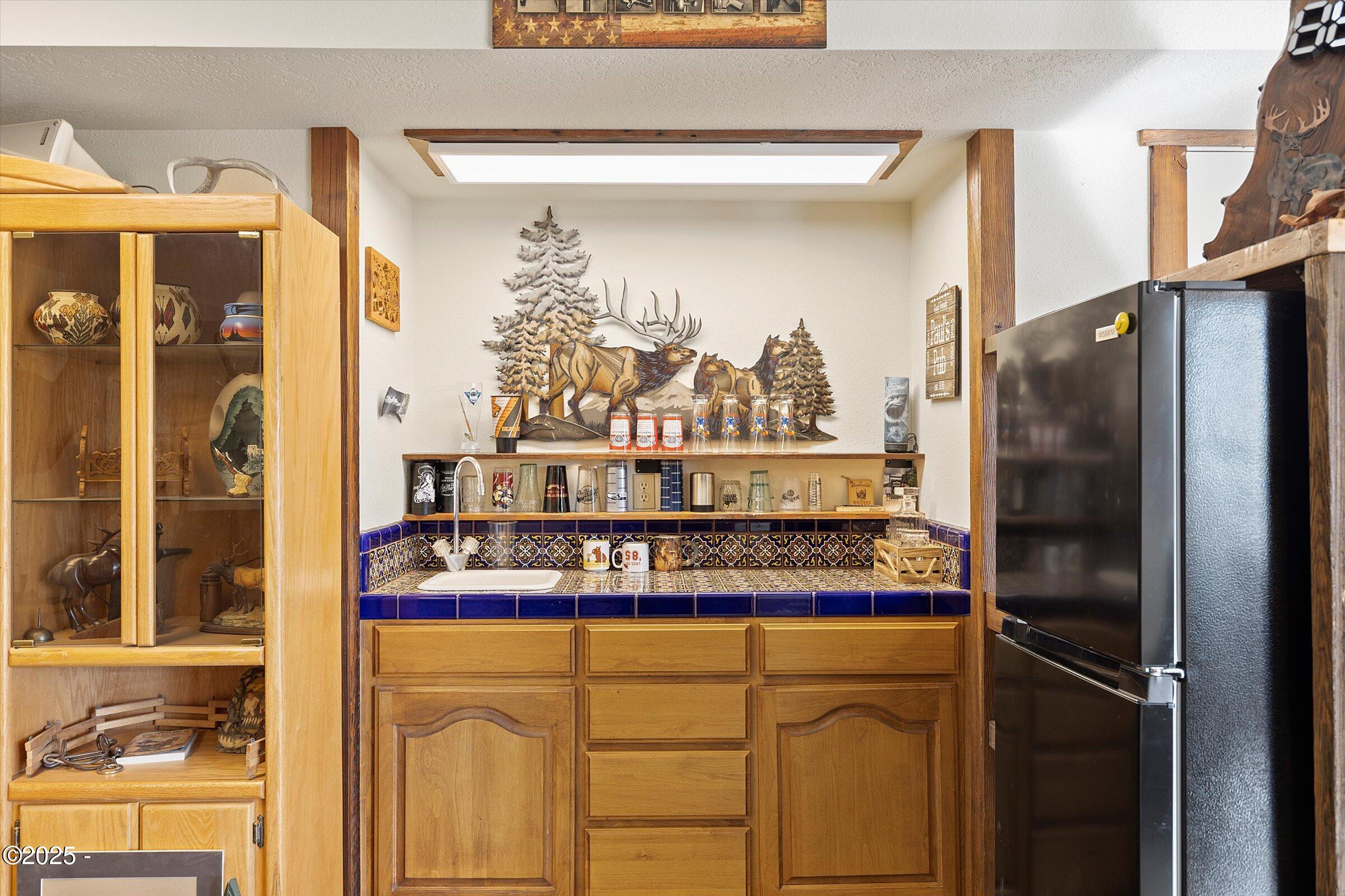 21560 Gooseneck Road Sheridan, OR 97378 - Photo 42 of 63 a kitchen with stainless steel appliances granite countertop a refrigerator and a cabinets