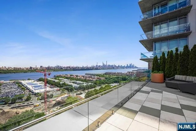 a view of city from terrace along with seating space