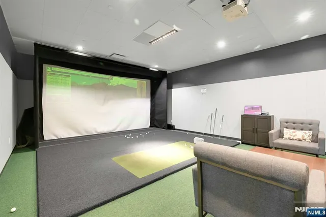 a kitchen with stainless steel appliances wooden cabinets and front door