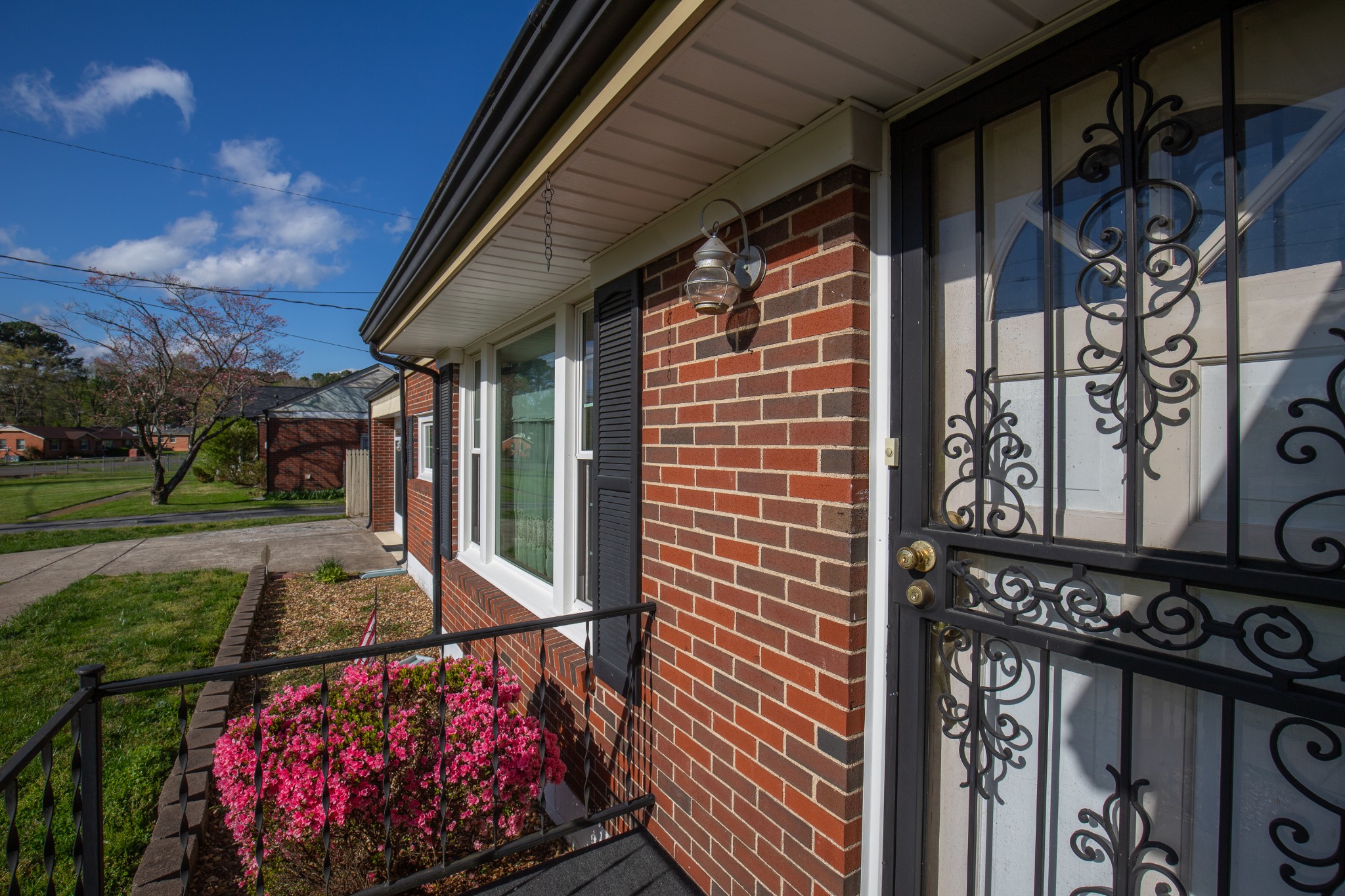 407 School Pass Madison, TN 37115 - Photo 13 of 15 a view of a patio with a table and chairs and potted plants