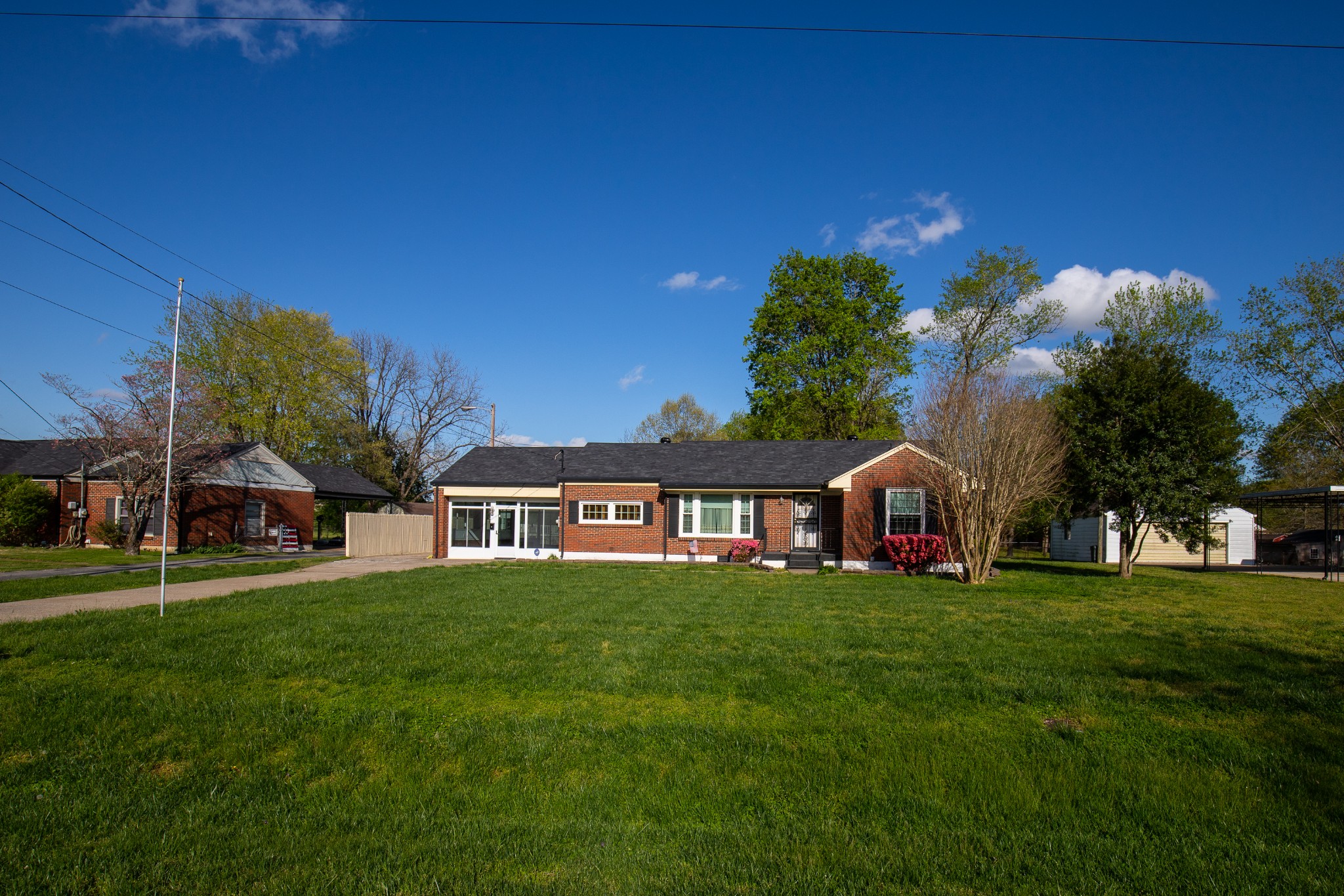 407 School Pass Madison, TN 37115 - Photo 14 of 15 a view of a house with a big yard
